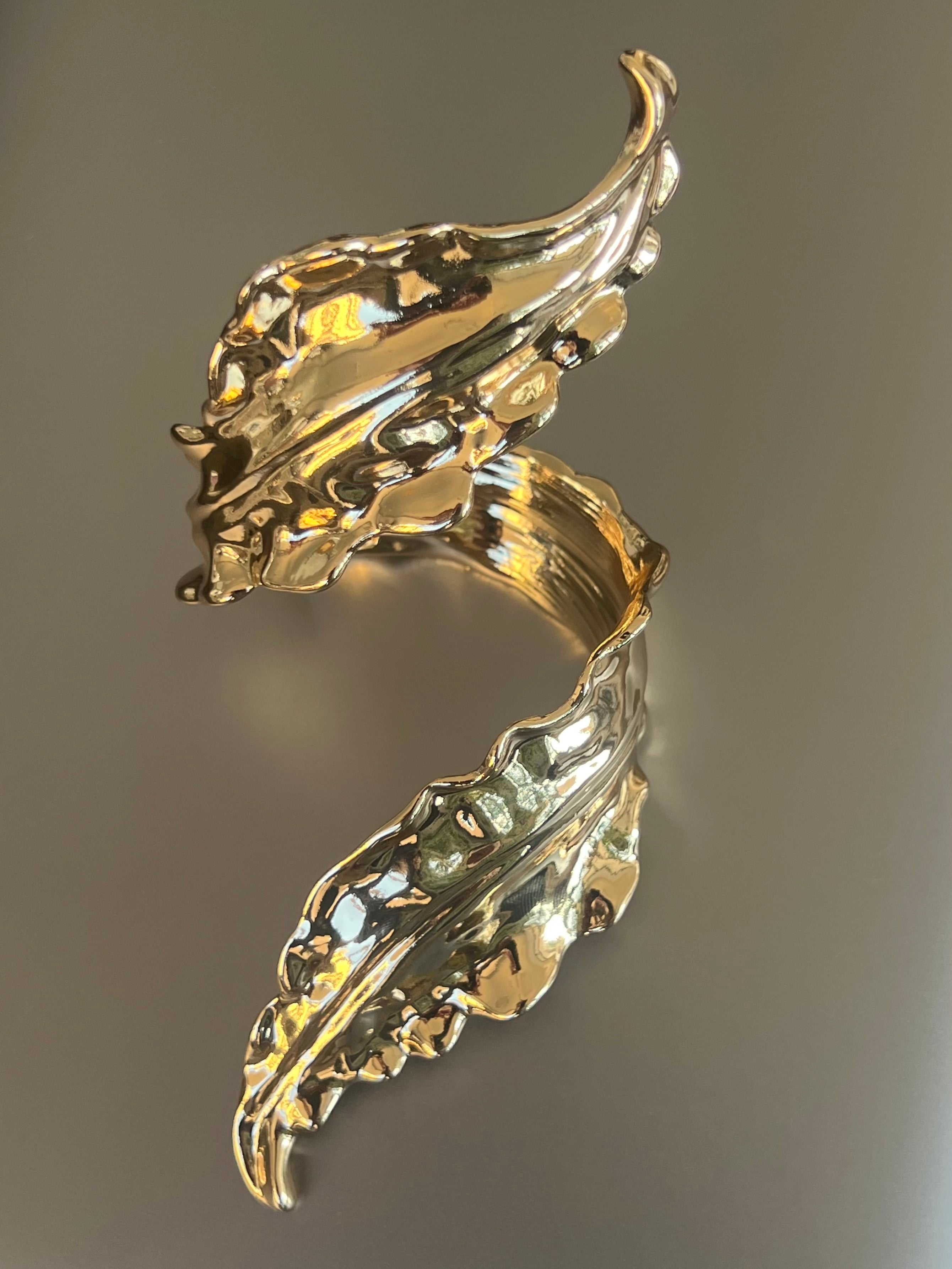 Luminous Leaf Cuff in gold tone