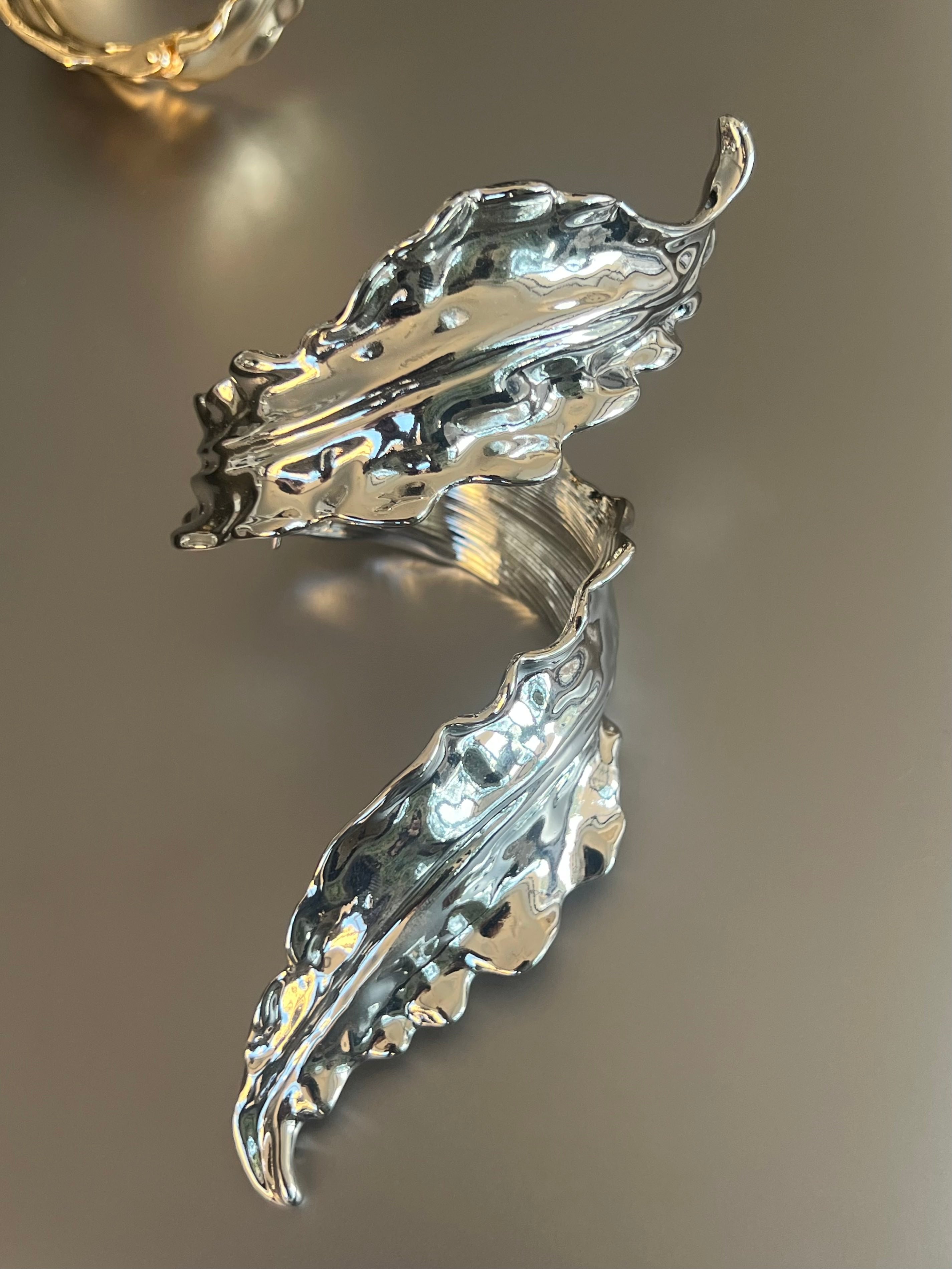 Luminous Leaf Cuff in silver tone