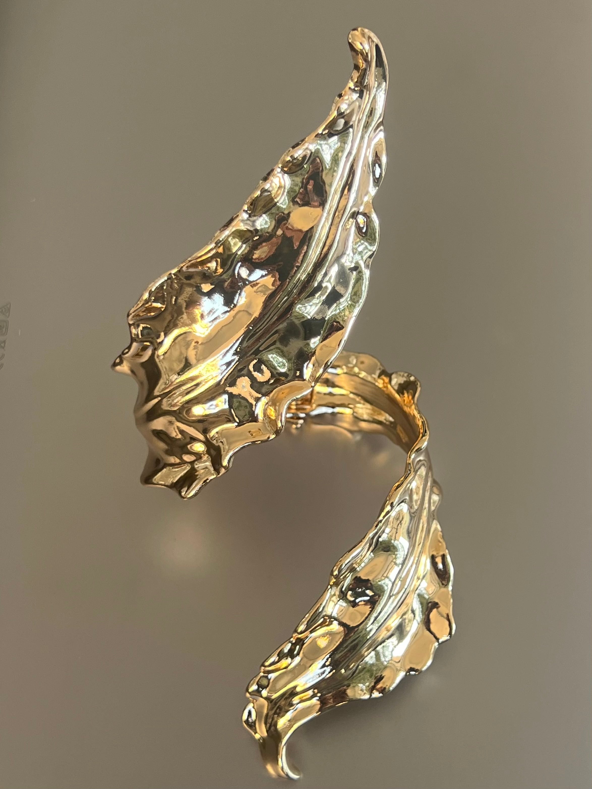Luminous Leaf Cuff in gold tone