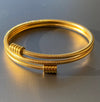 Wraparound Ribbed Bangle in Yellow Gold